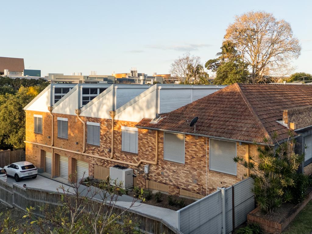 Brisbane couple lists hospital laundry turned family home to downsize