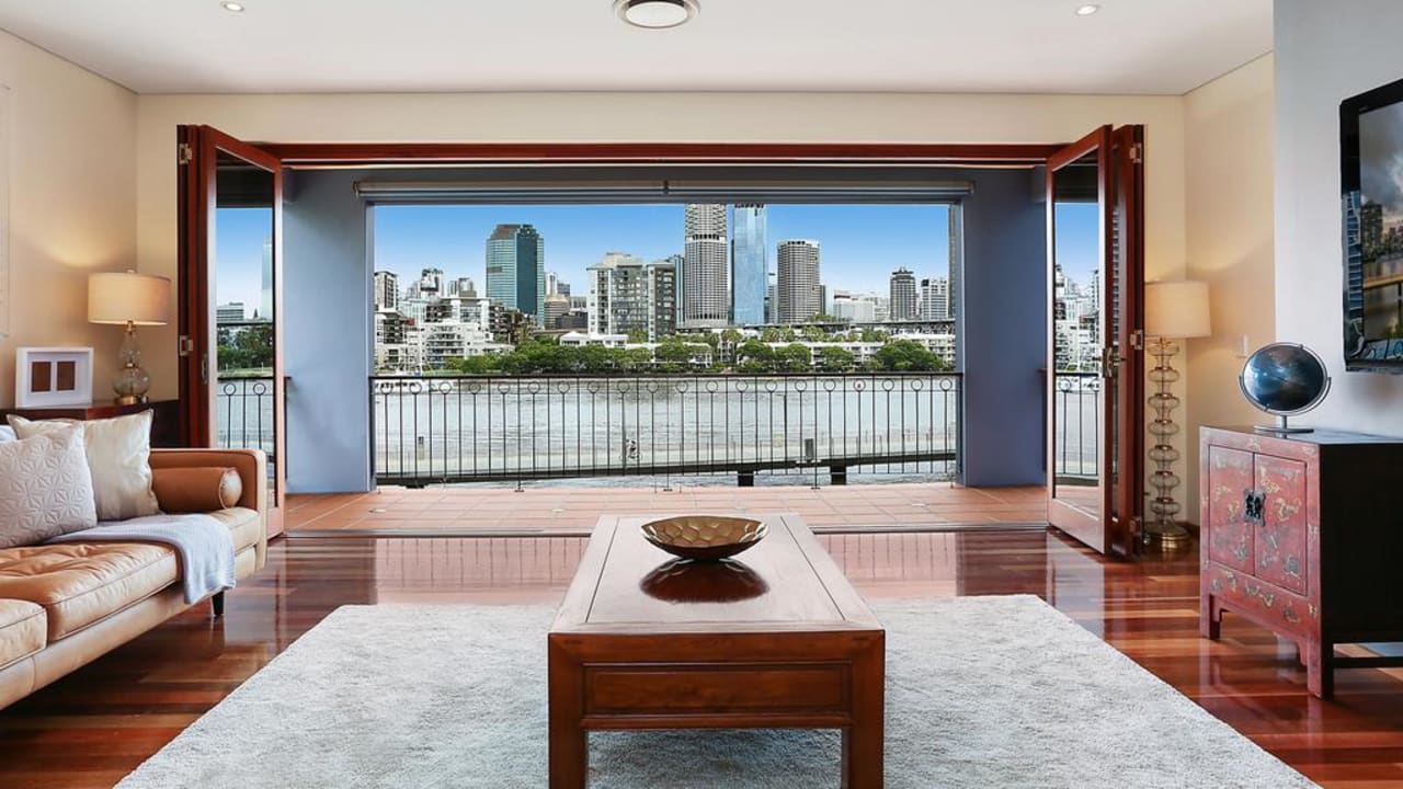 Dooley puts ‘unicorn’ Brisbane riverfront home on the market